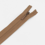 Many of the YKK products that make the biggest difference are those that cannot be seen, including in outdoor furniture applications. When the slider on YKK's CONCEAL® zipper is closed, the zipper disappears and appears as a finished seam. We recommend use of this product in pillows since the best pillow designs are those that keep the zipper out of the way so as not to compromise user comfort.